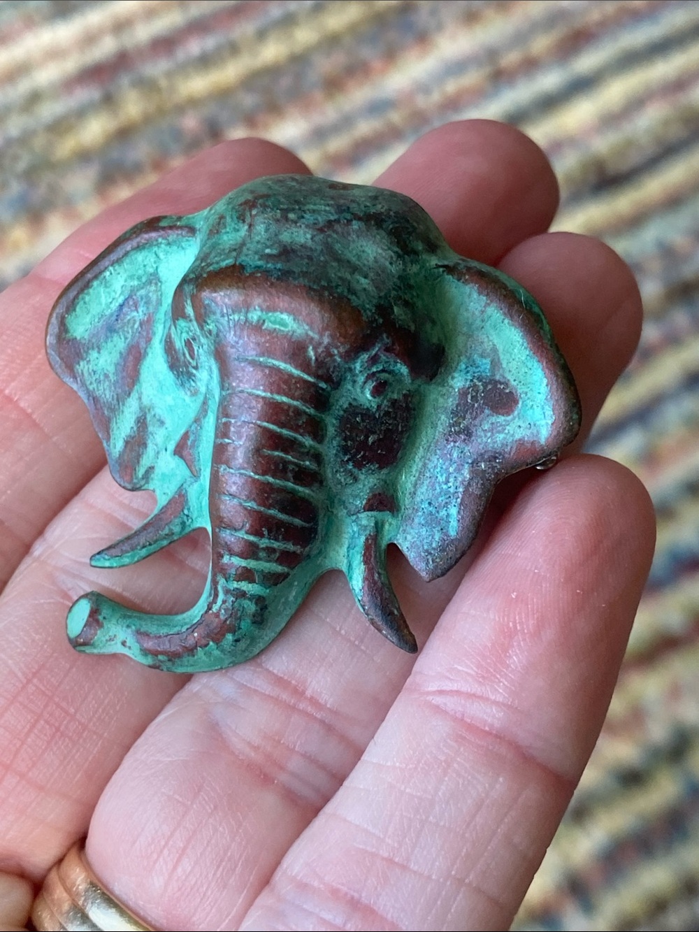 Copper elephant brooch